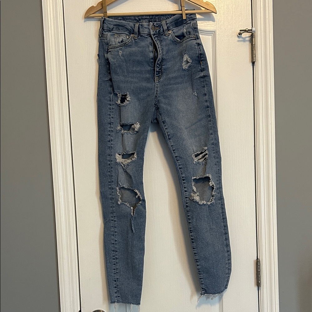 Classic Distressed Skinny Jeans in Blue size 4